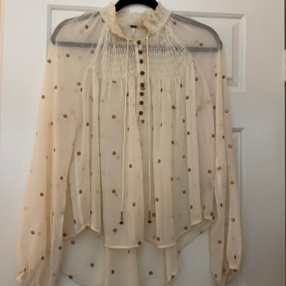 Free People shear high neck blouse.